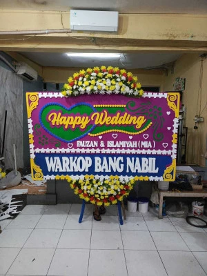 Papan Bunga di Tugu Utara